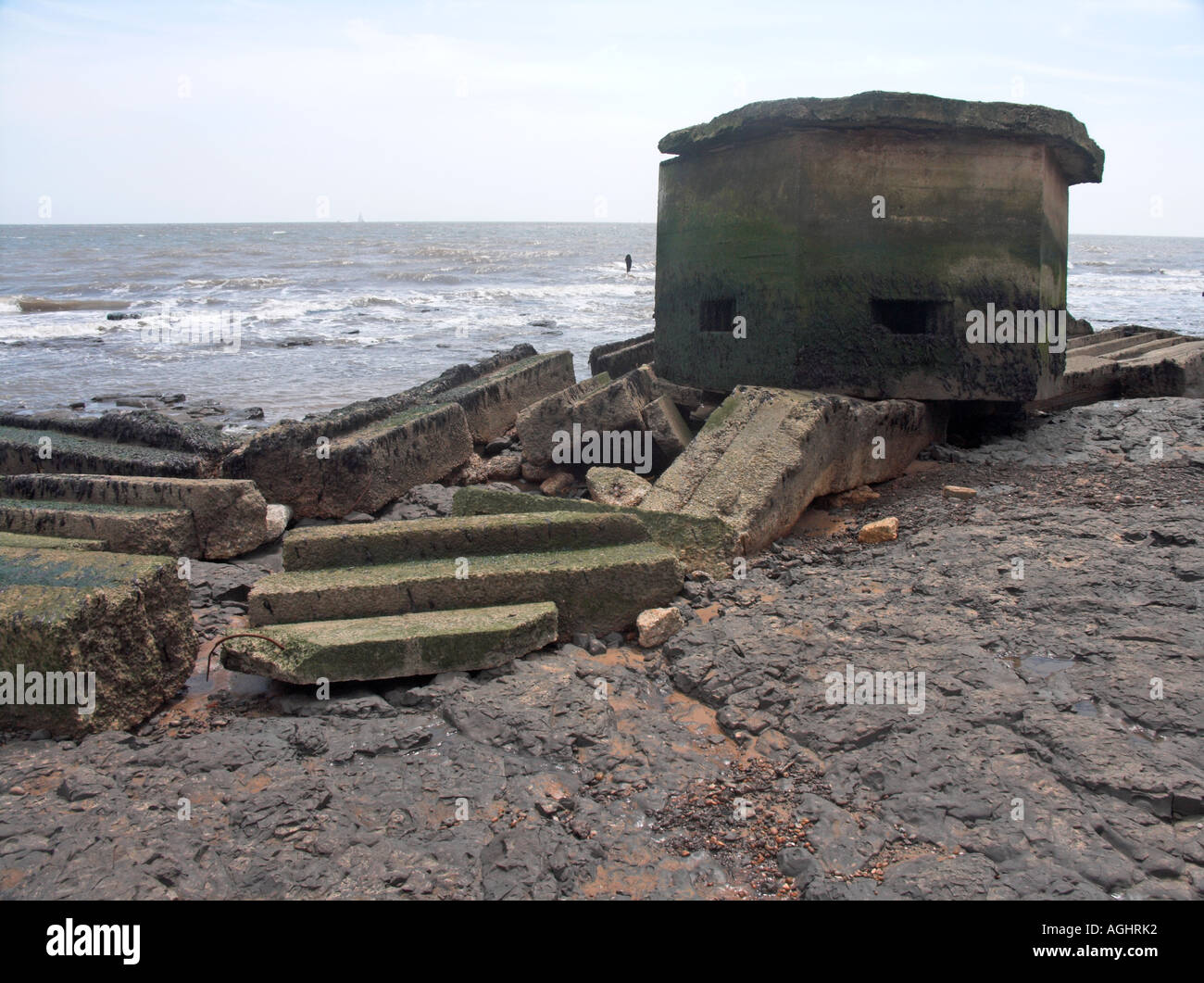 Second world war pill box eroded by the sea Bawdsey, Suffolk Stock
