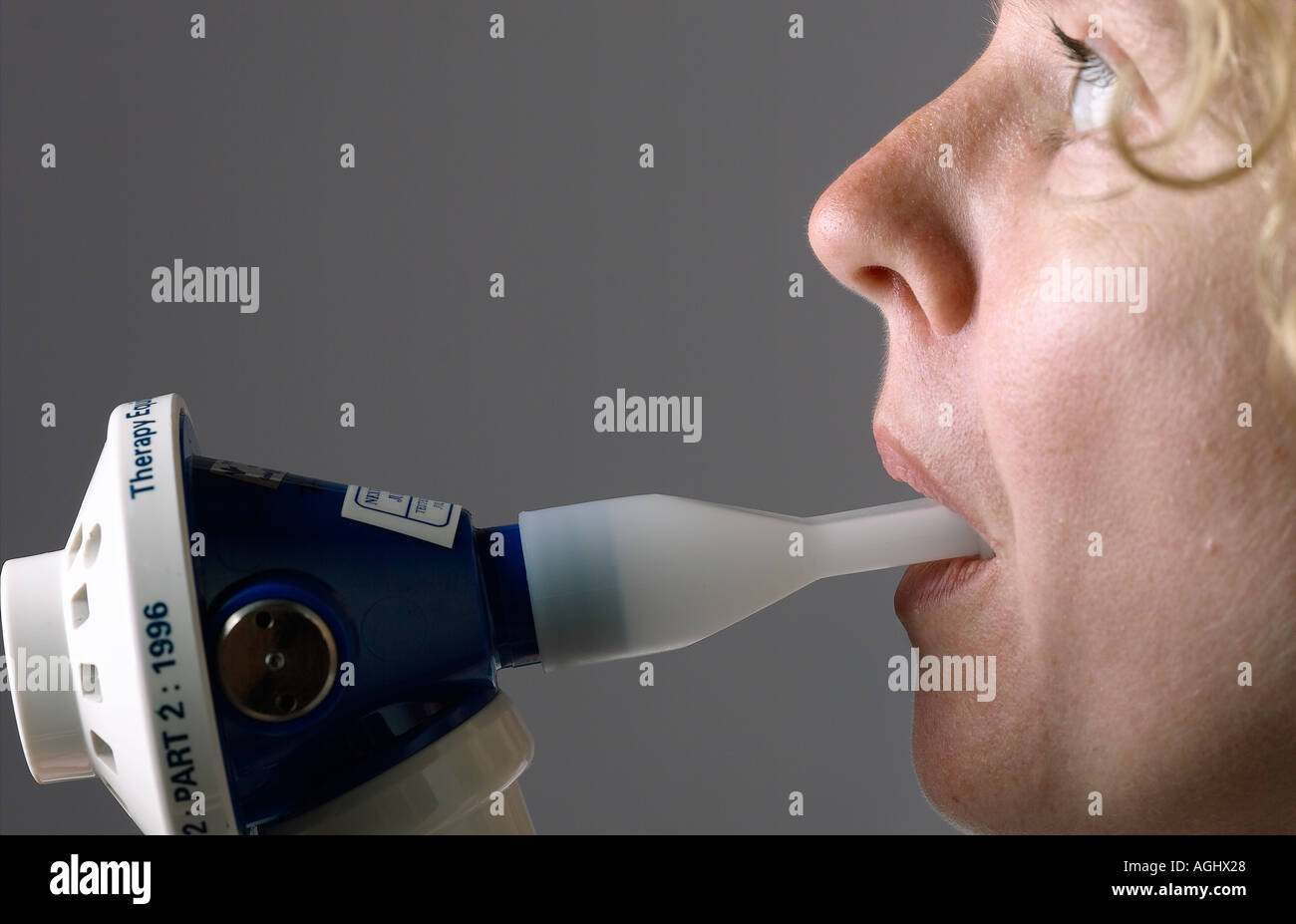 young woman using gas and air for pain relief Stock Photo