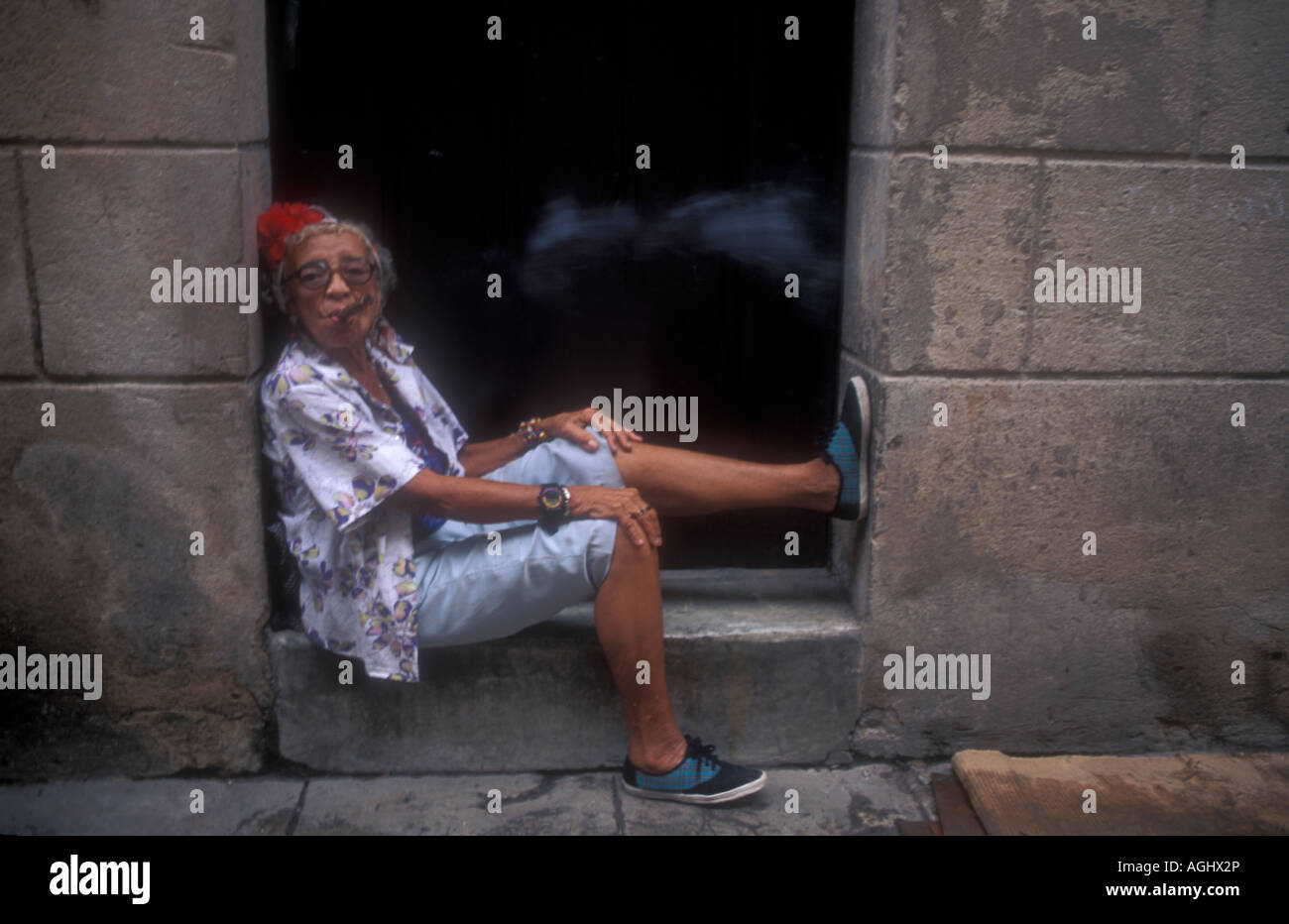 Elderly woman smoking a cigar in Havana, Cuba, Cuba Stock Photo
