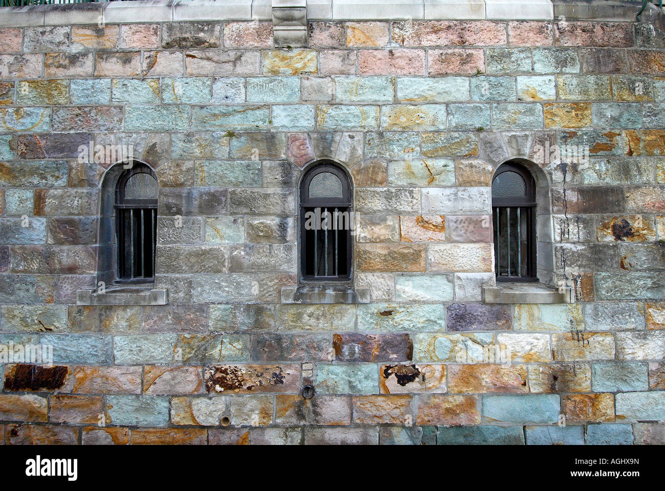 Bars in window in sandstone wall Stock Photo Alamy