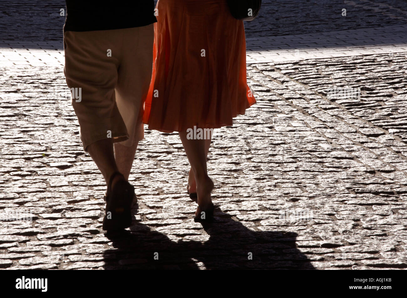 Girl friends walking in sunshine in London Stock Photo Alamy