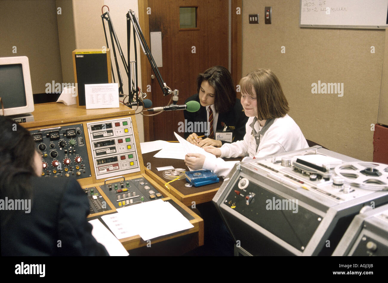 Take your daughters to work scheme with girls in a radio station Stock Photo
