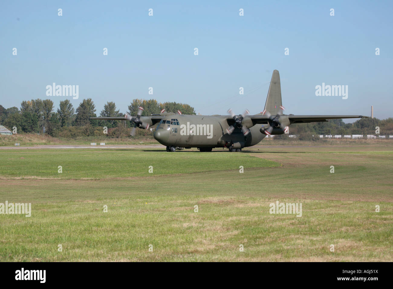 Hercules C-130 on the grass runway at Shoreham airshow, Shoreham airport, West Sussex, England, UK Stock Photo