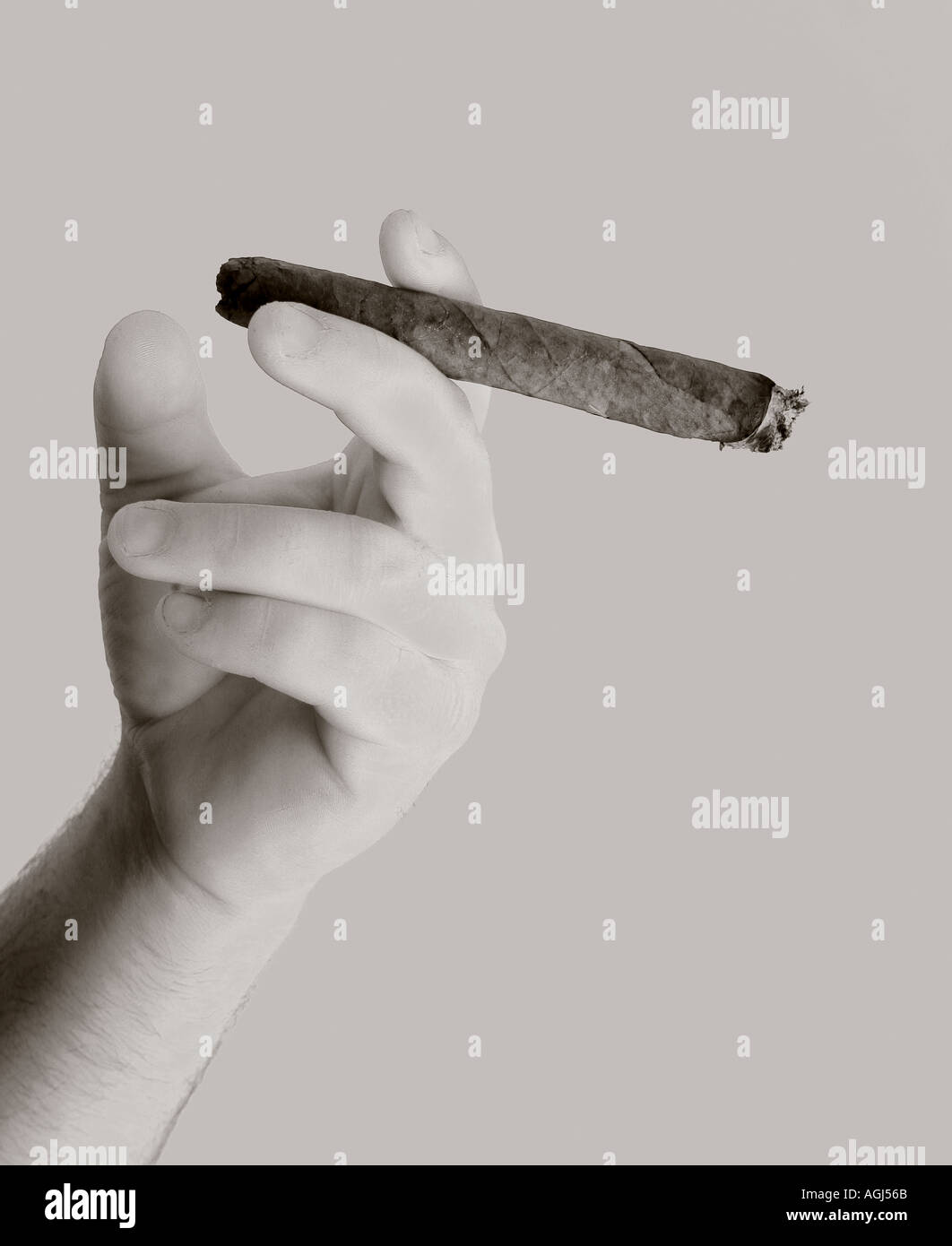 Hand with cigar Stock Photo