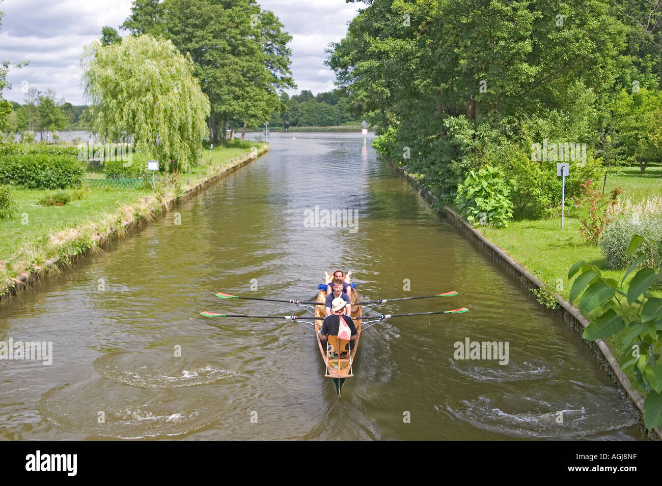 germany brandenburg spreeforest canal with rowing boat at the little koeriser lake Stock Photo