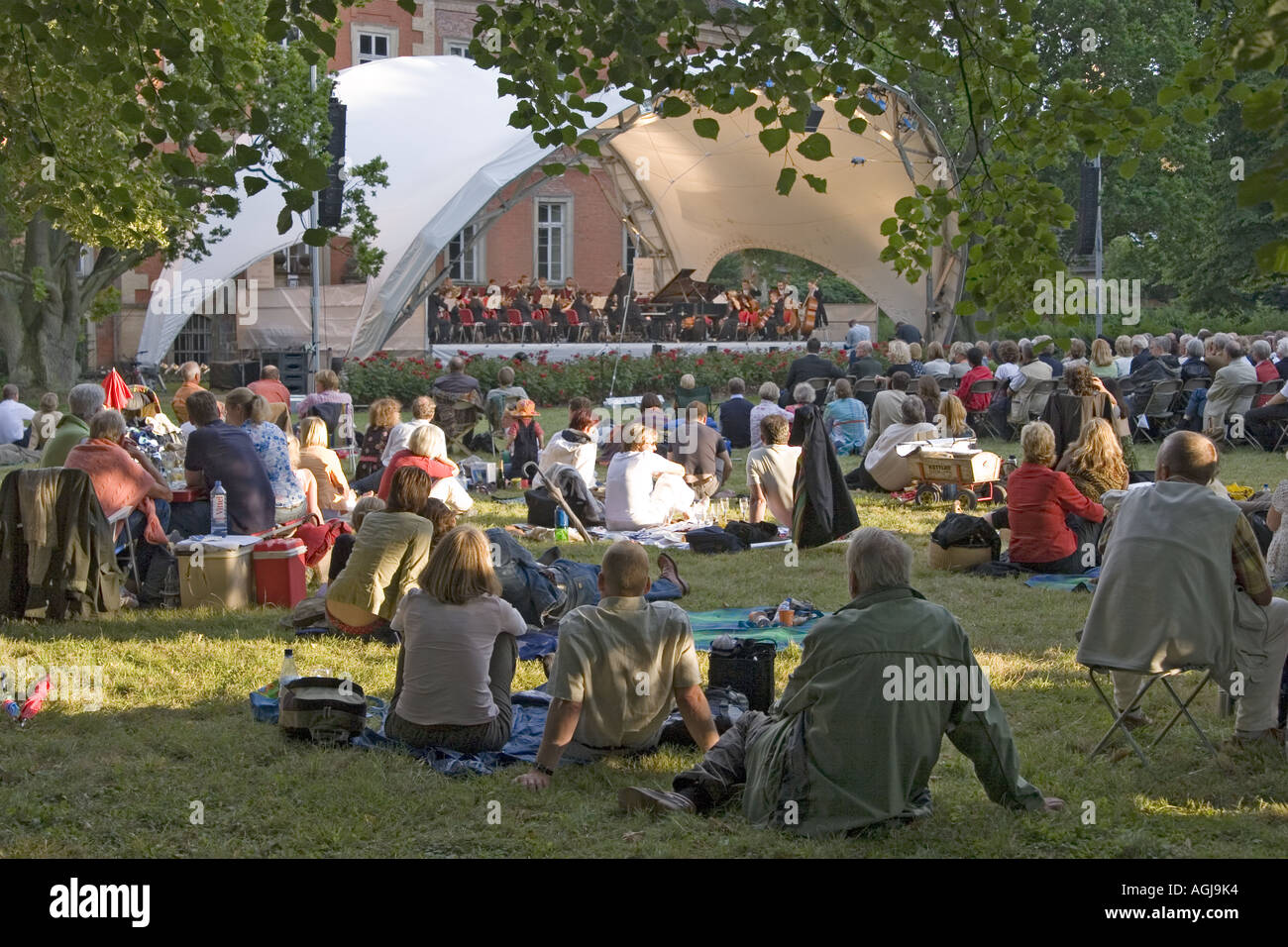 germany mecklenburg vorpommern audience is listening a classic concert in the park of castle bothmer Stock Photo
