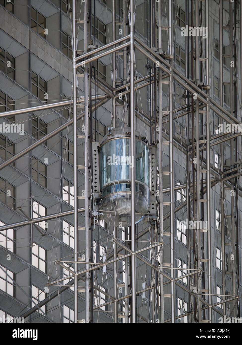 The external elevator lift of the Grande Arche building in La Defense Paris France Stock Photo