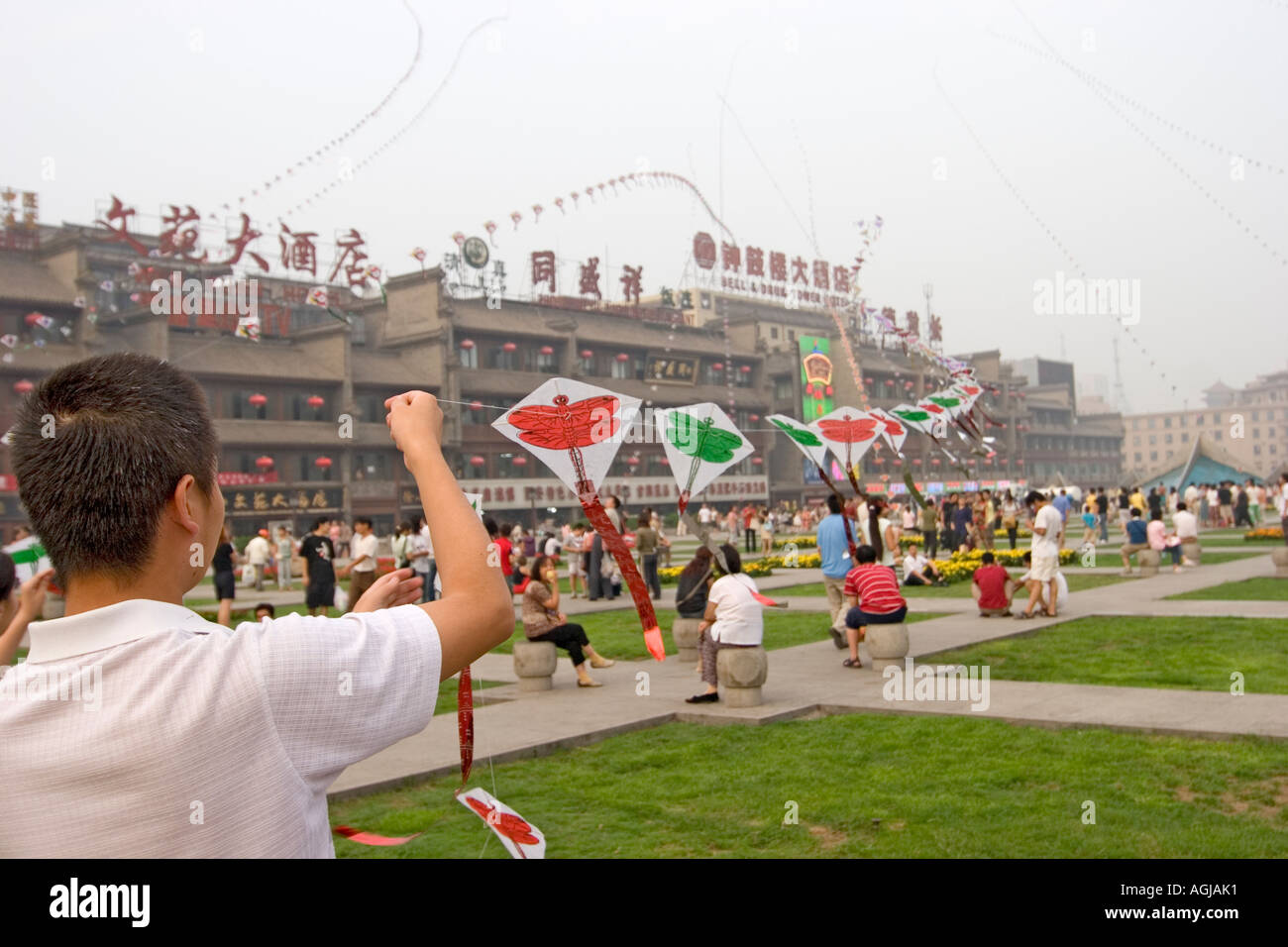 asia china xian people let their kites ride Stock Photo