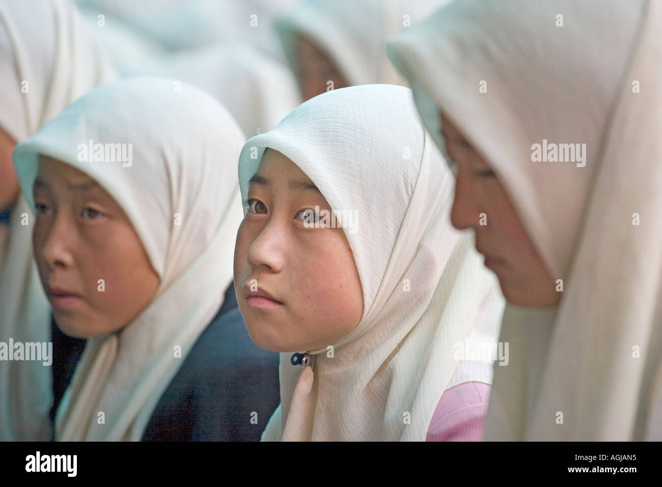asia china schoolgirls in mosque of the hui at silkroad Stock Photo