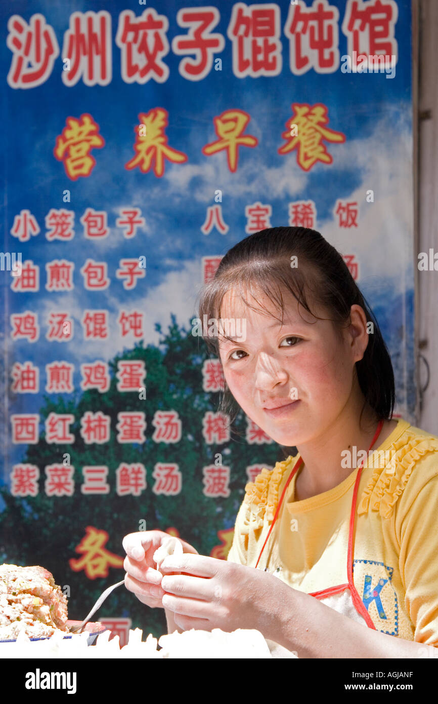 asia china yong woman on market in dunhuang silkroad Stock Photo