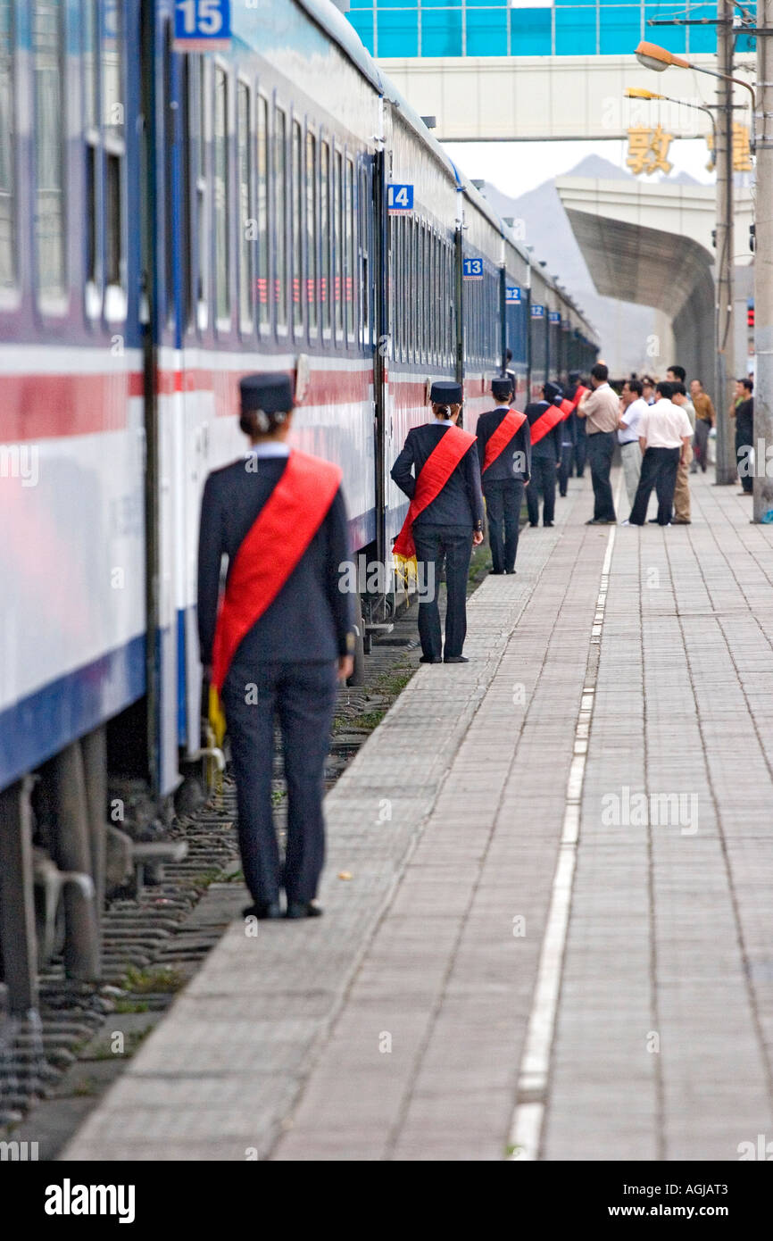 asia china chinese officer in front of train on platform in liuyuan Stock Photo