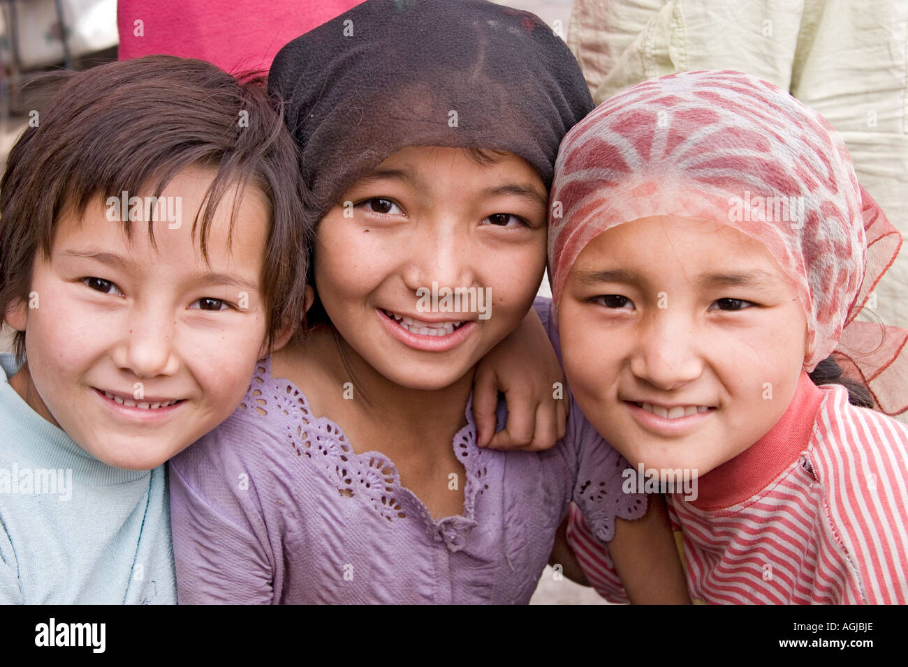 asia china portrait of three young girls of the ethnic group named uygur in yutian at silkroad Stock Photo