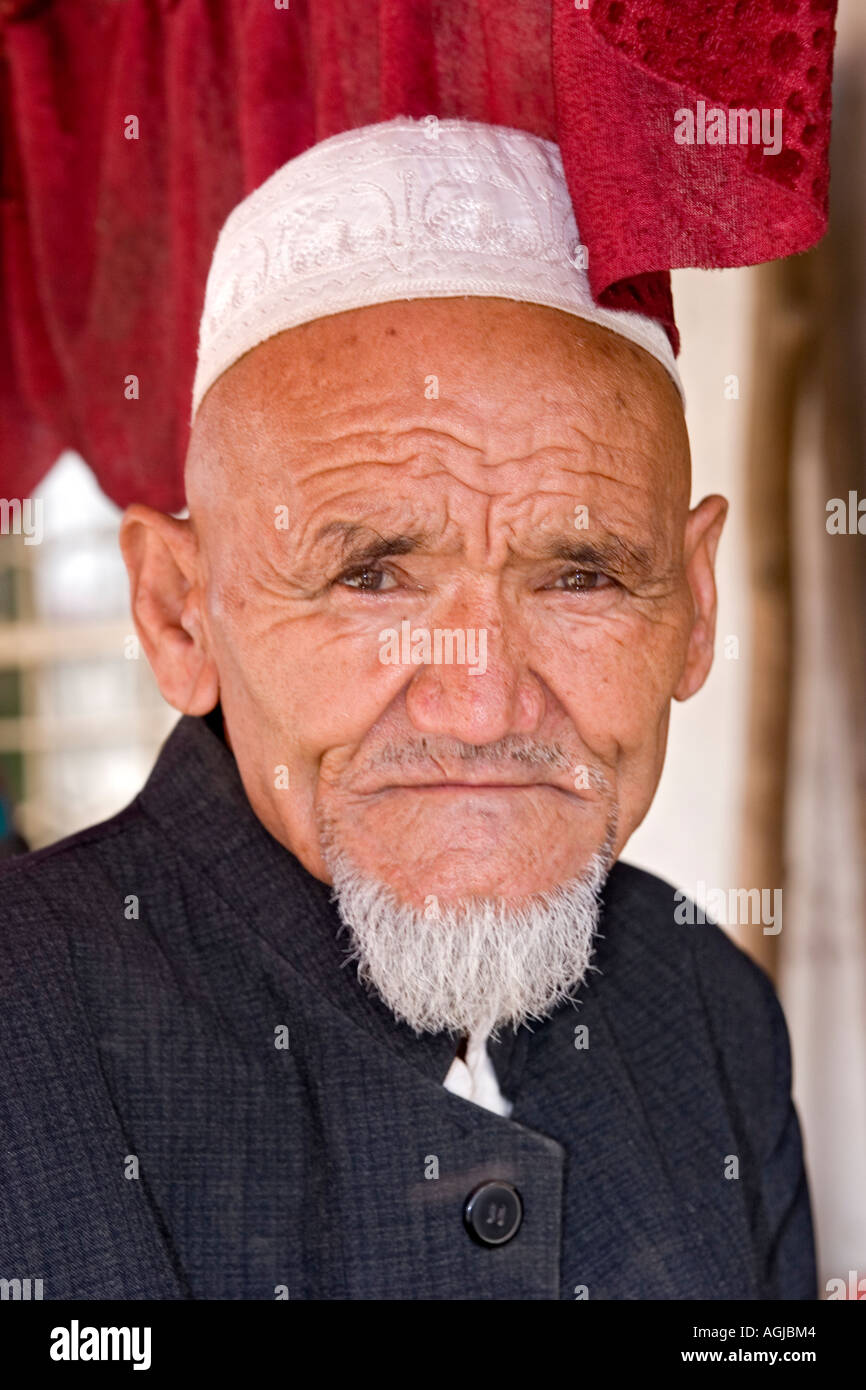asia china portrait of an old man of the ethnic group of the uygur in yutian at silkroad Stock Photo