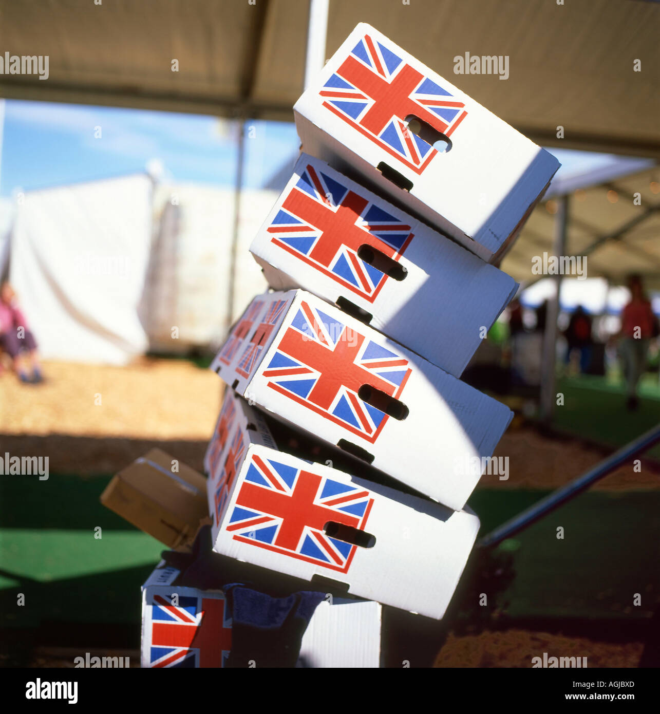 Union Jack flag label on unstable precariously stacked supermarket fresh food packing boxes about to topple Great Britain UK KATHY DEWITT Stock Photo