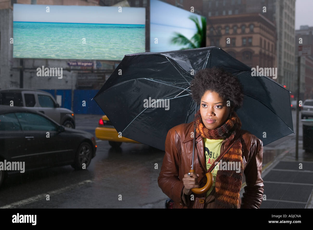 Female pedestrian with umbrella Stock Photo - Alamy