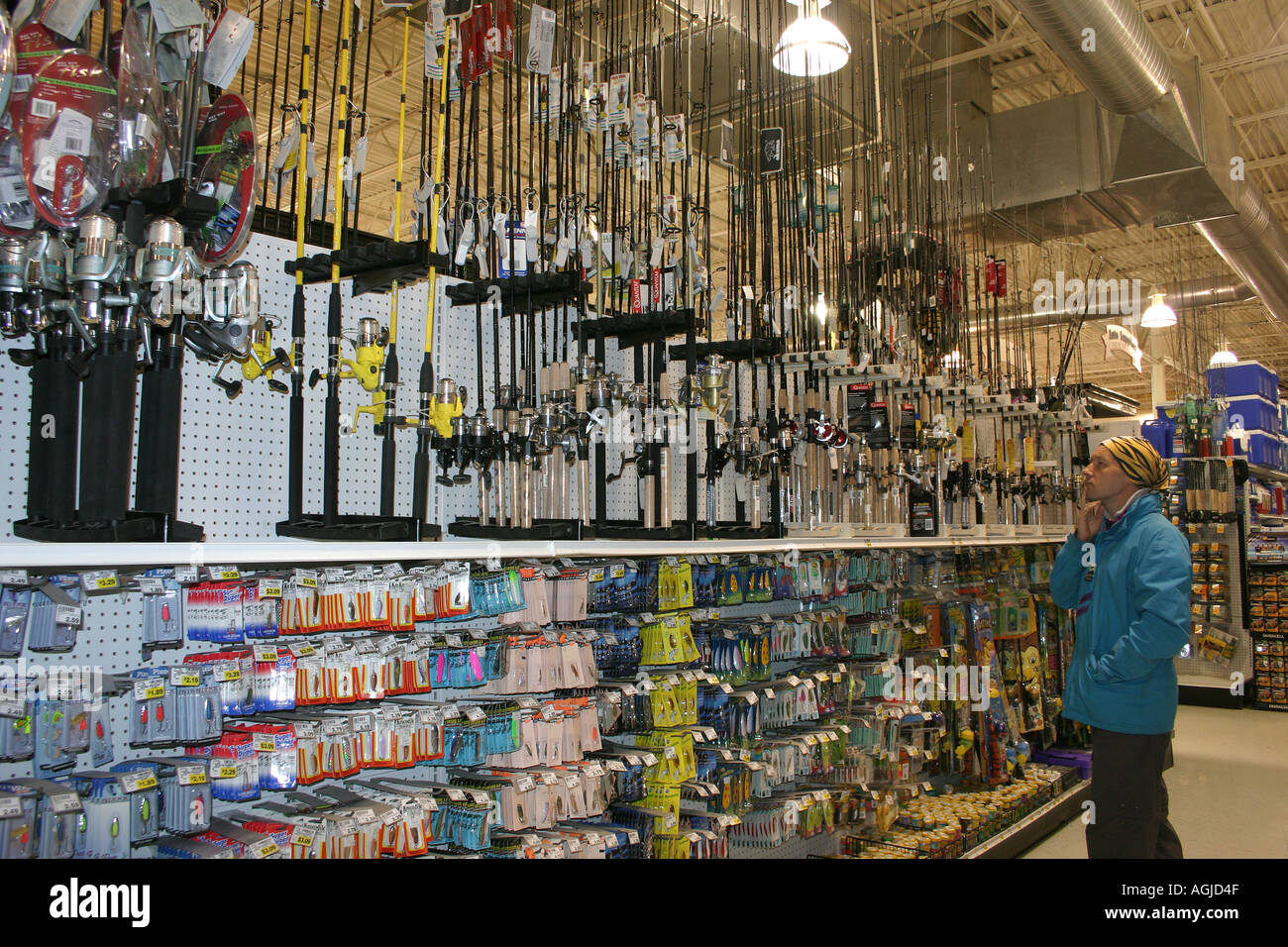 MR man studies the fishing gear in a hardware shop in Anchorage Alaska USA  Stock Photo - Alamy