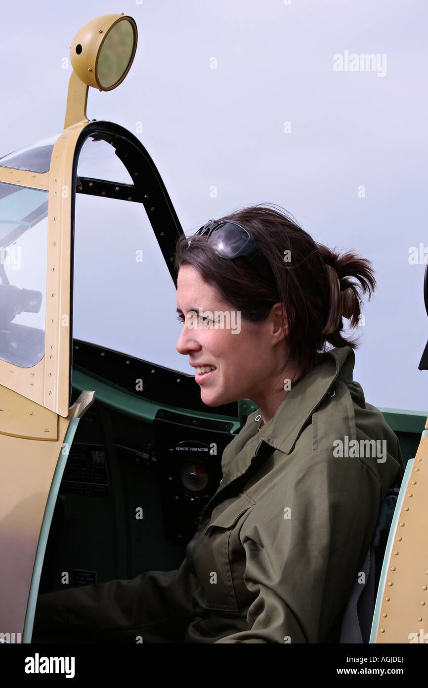 Georgie Palmer from BBC South Today sitting in the cockpit of Spitfire at Shoreham Airshow, Shoreham Airport, West Sussex, England, UK Stock Photo