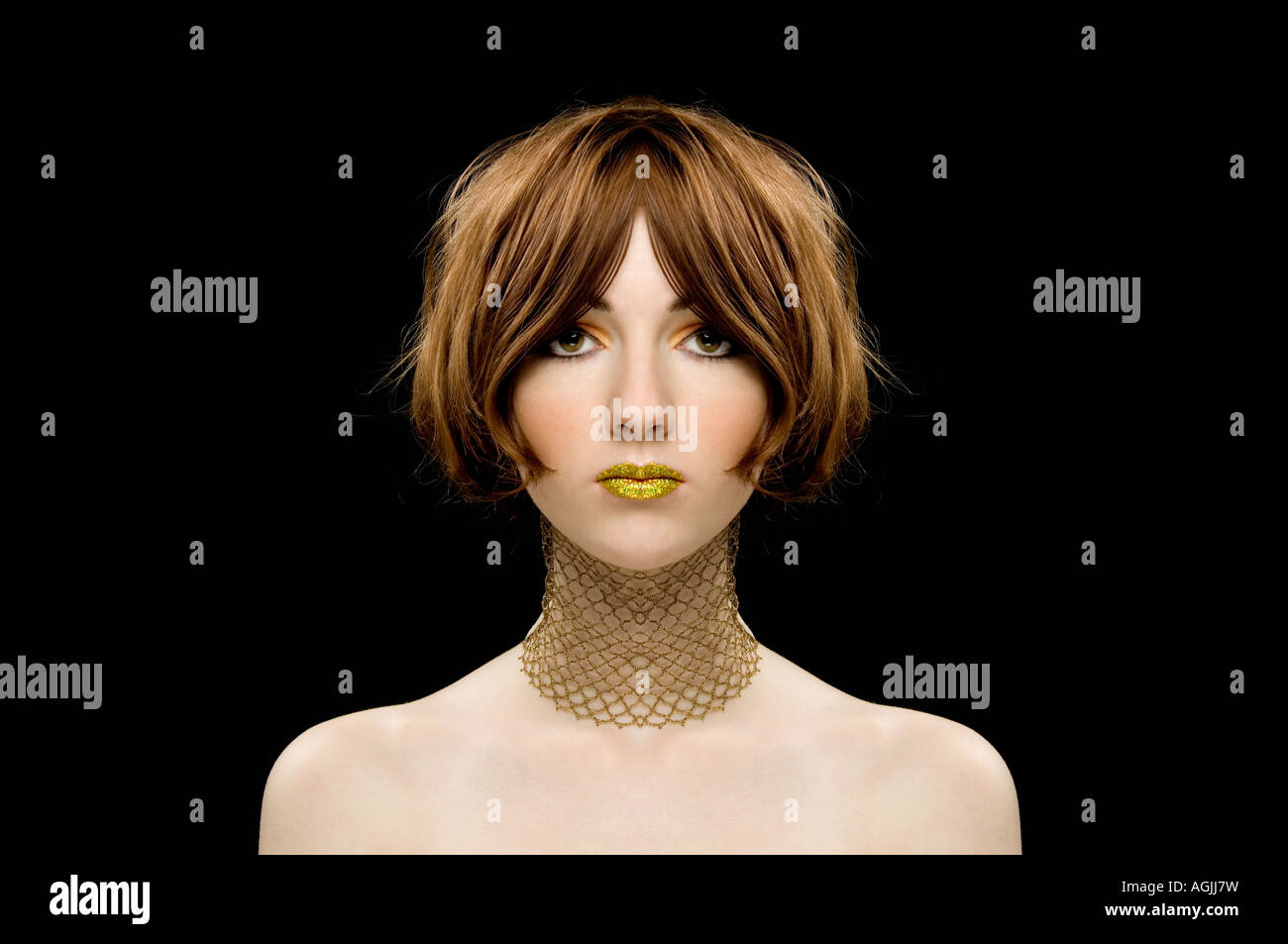 Woman wearing gold lipstick hi-res stock photography and images - Alamy