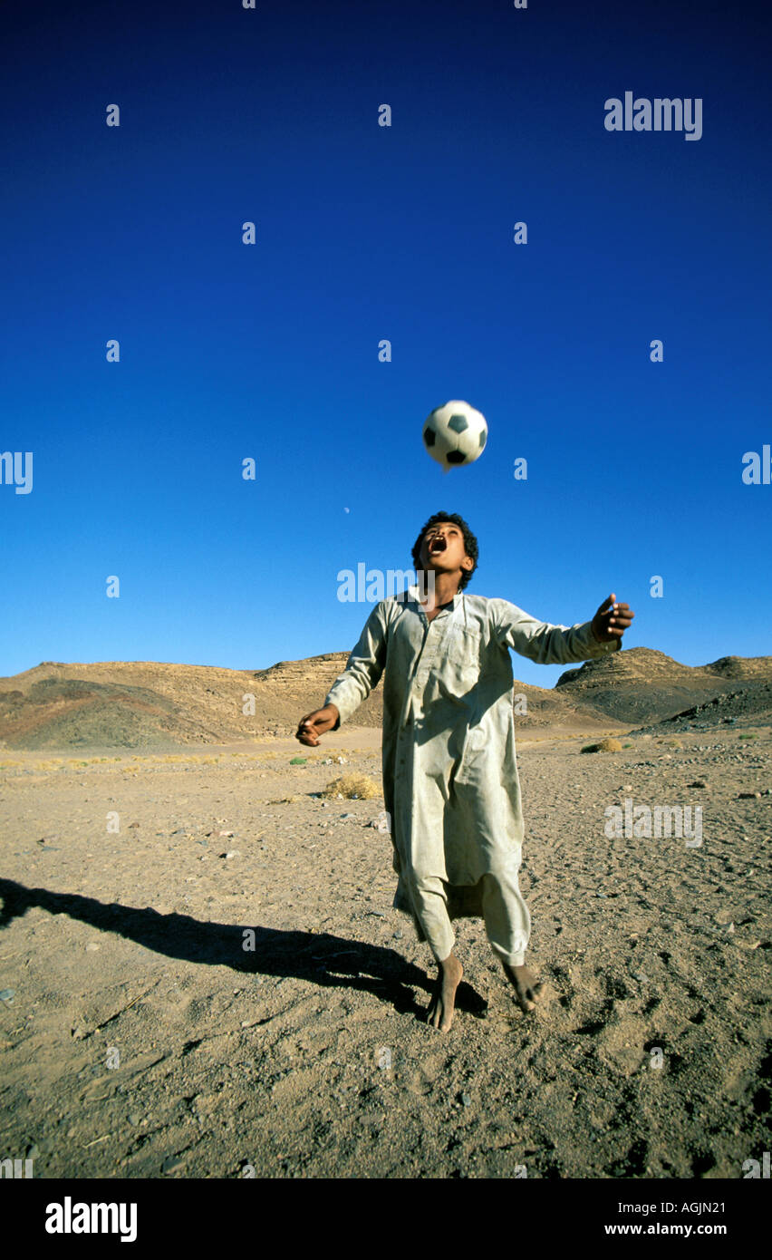 Sinai Adel is playing with football Stock Photo