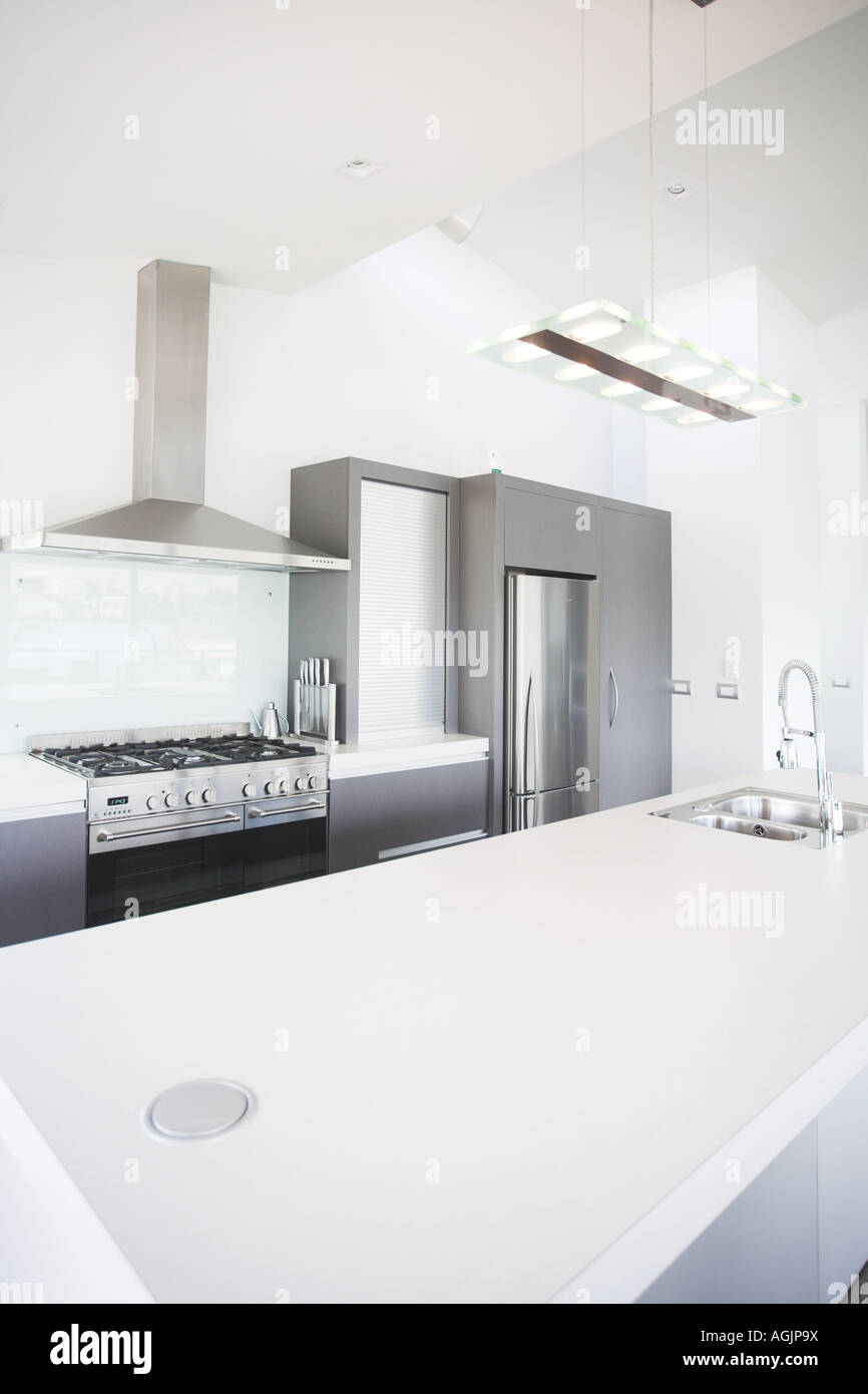 Modern kitchen with white appliances Stock Photo - Alamy