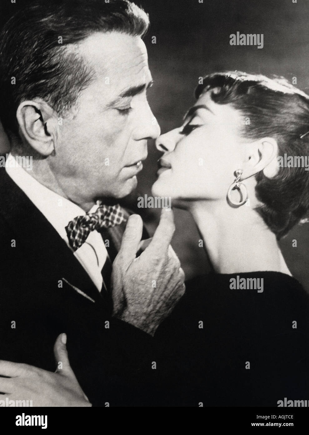 SABRINA Audrey Hepburn and Humphret Bogart in the 1954 film also known as Sabrina Fair Stock Photo