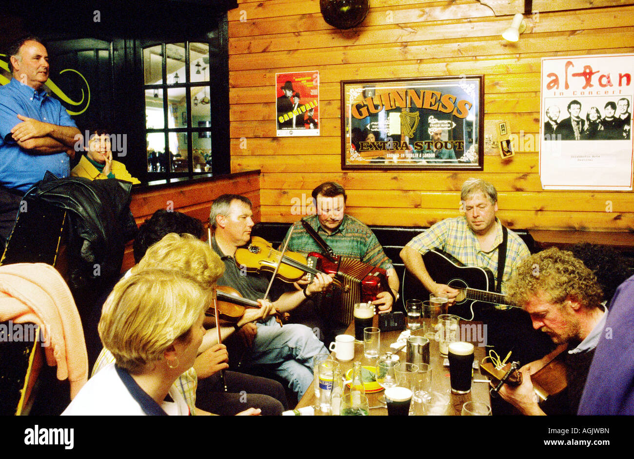 Traditional Irish pub music session in Days Bar on the west coast island of Inishbofin, County Galway, Ireland. Stock Photo