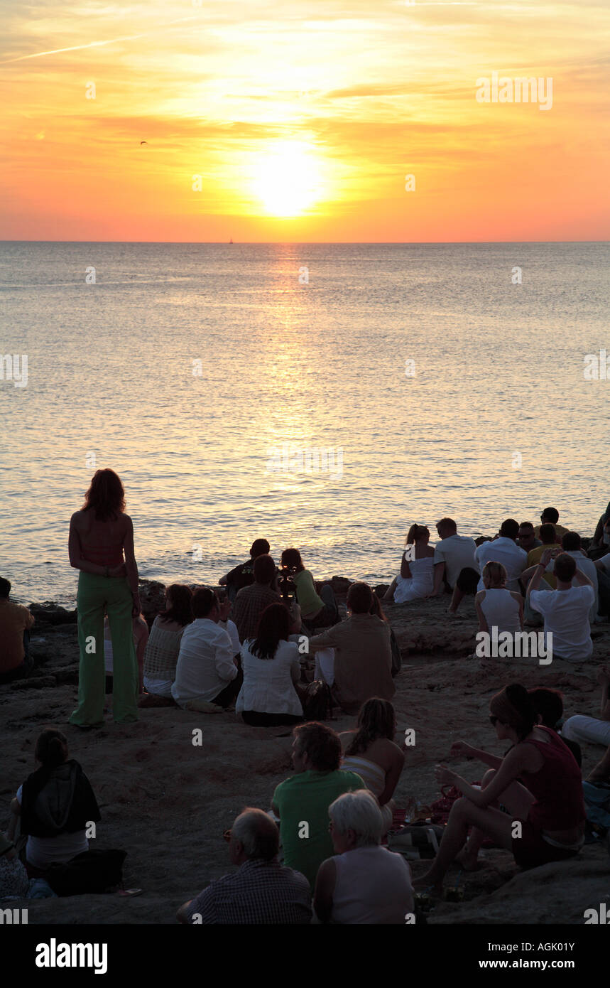 Tourists at Cafe del Mar, watching the sunset, Ibiza, Spain Stock Photo