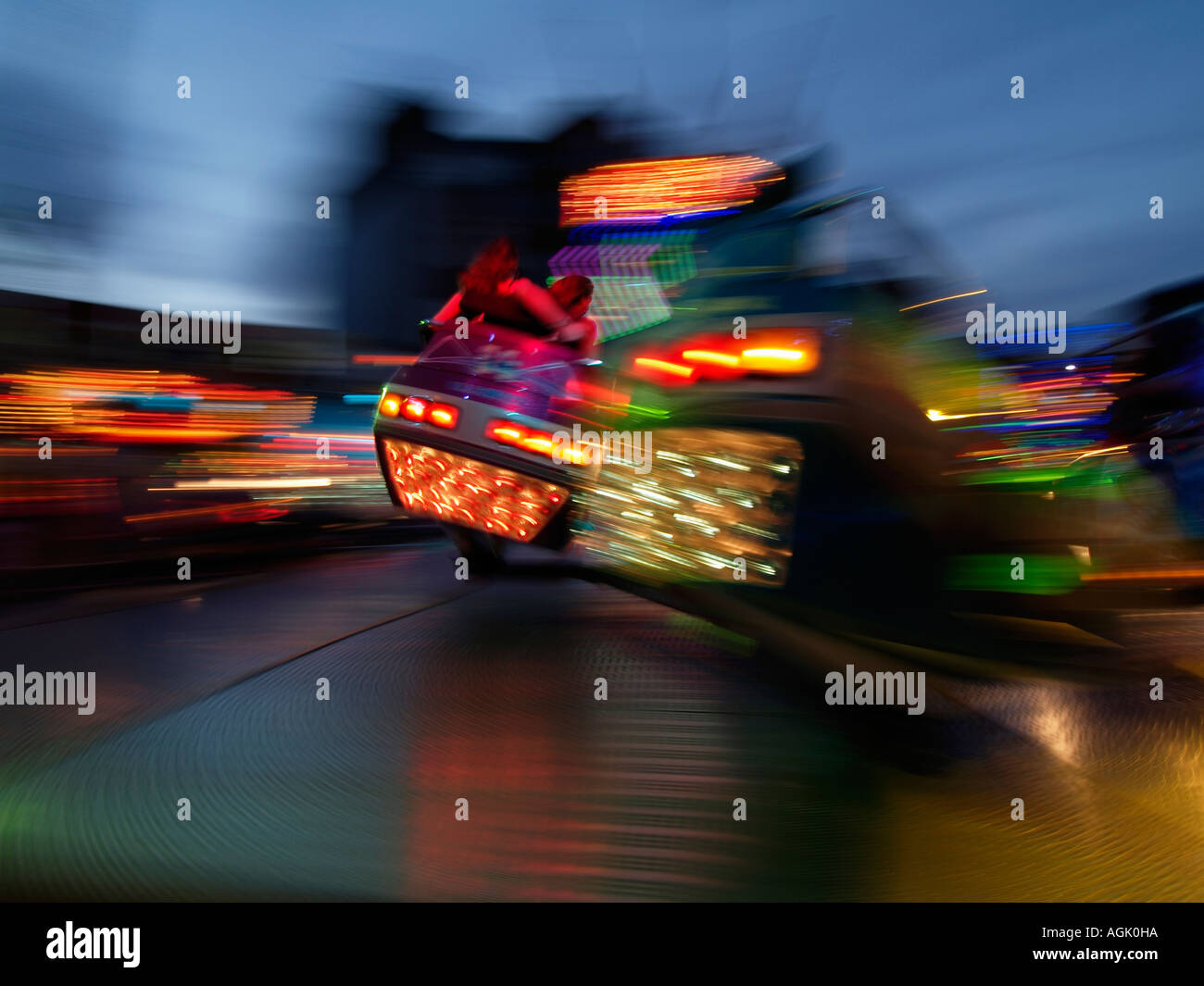 People in fast spinning ride on the yearly fun fair fairground in Tilburg the Netherlands Stock Photo