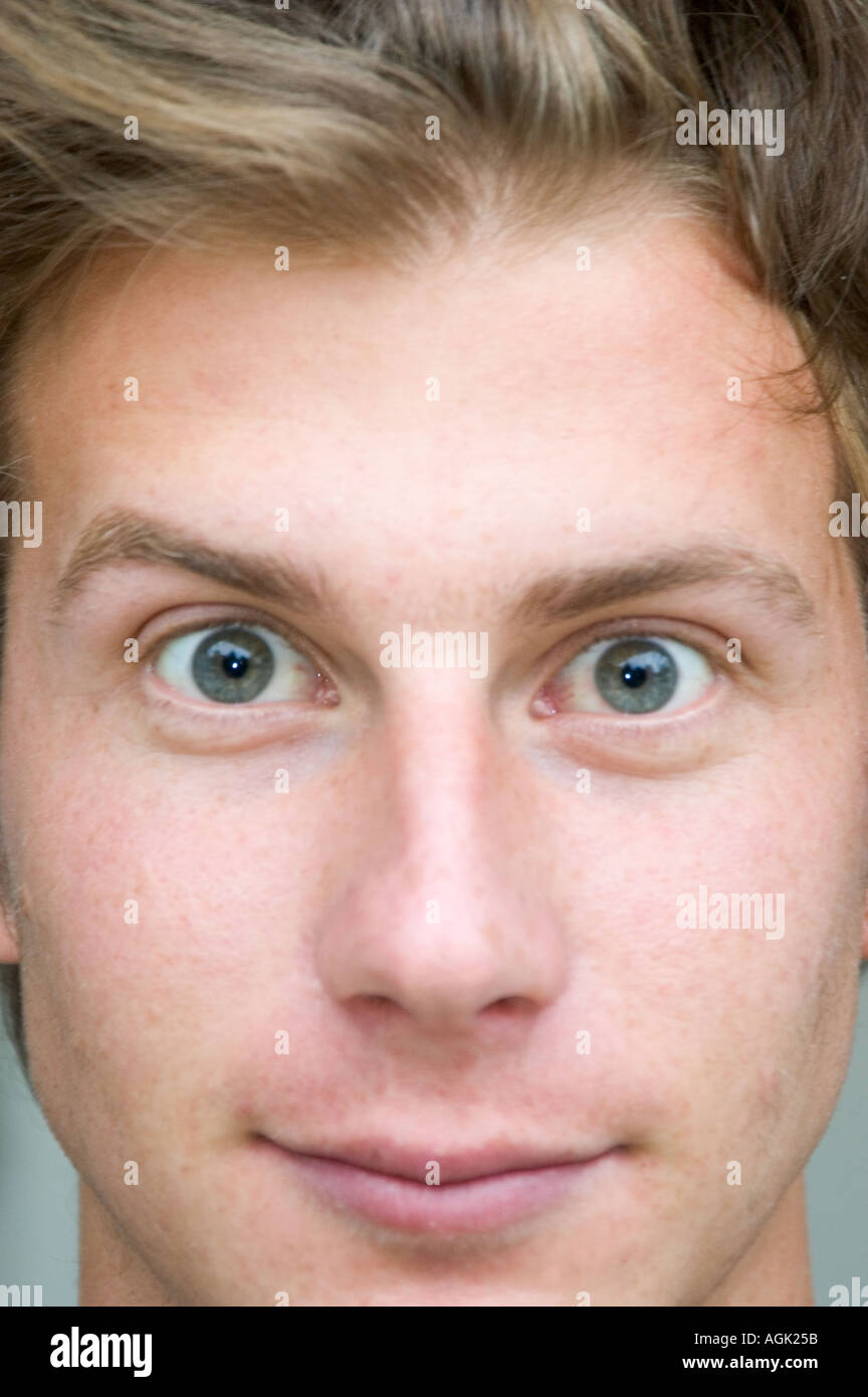 Portrait of a Young man looking at camera Stock Photo - Alamy