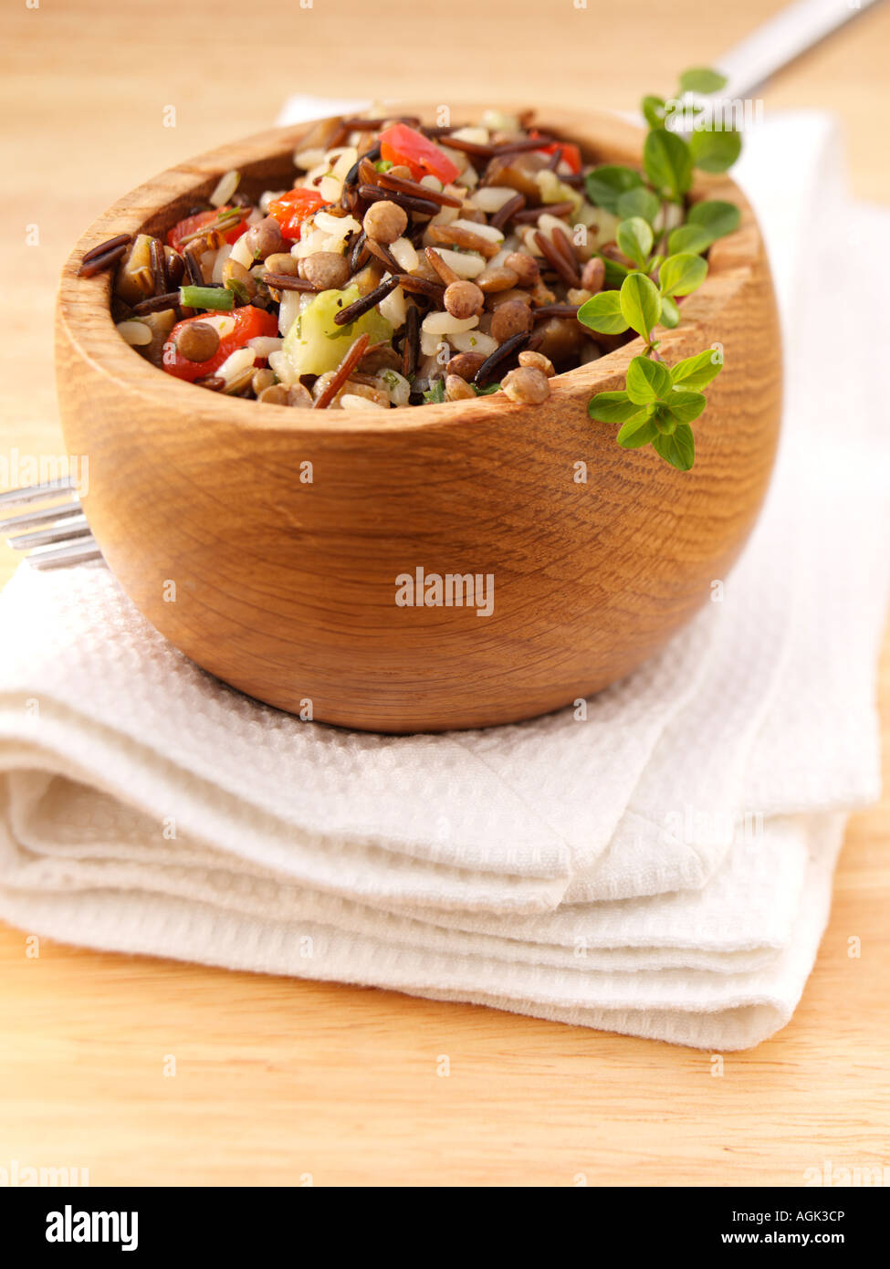A wooden bowl of wild rice lentil salad Stock Photo Alamy