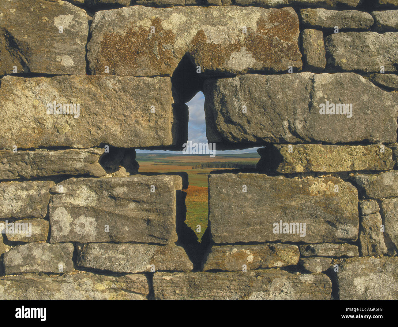 Arrow slit at Rothley Castle near Rothbury Northumberland Stock Photo