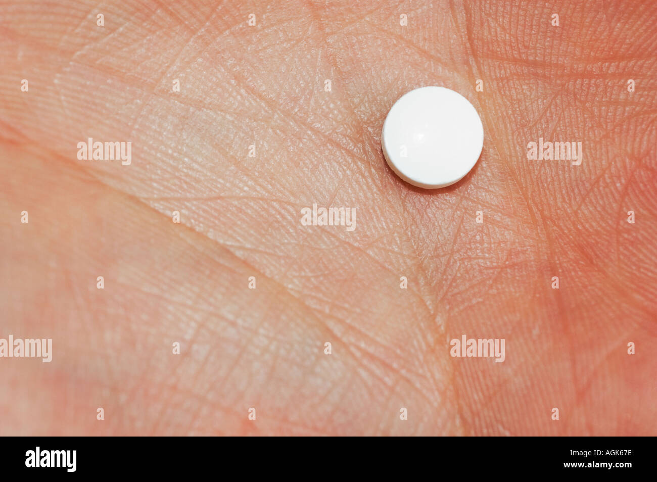 Medical Pill in the Palm of a hand Stock Photo