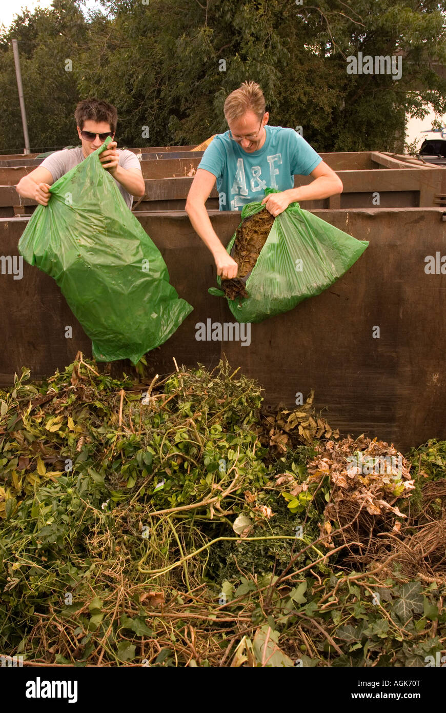 Men disposing of domestic garden waste at Space Waye Recycling and