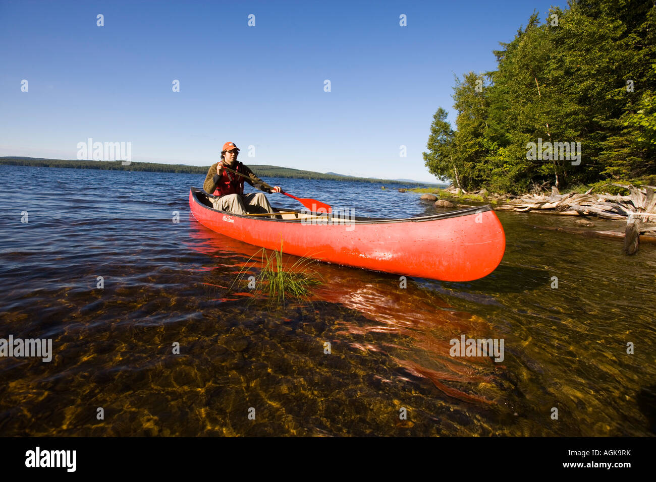 Canoeing on Maine s Brassua Lake Near Moosehead Lake owned by Plum