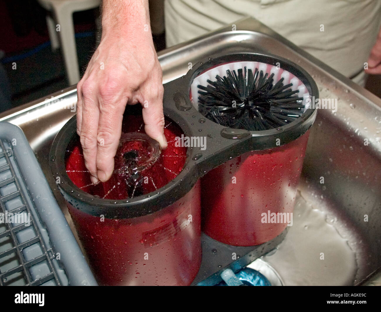 Using a beer glass washing machine Stock Photo Alamy