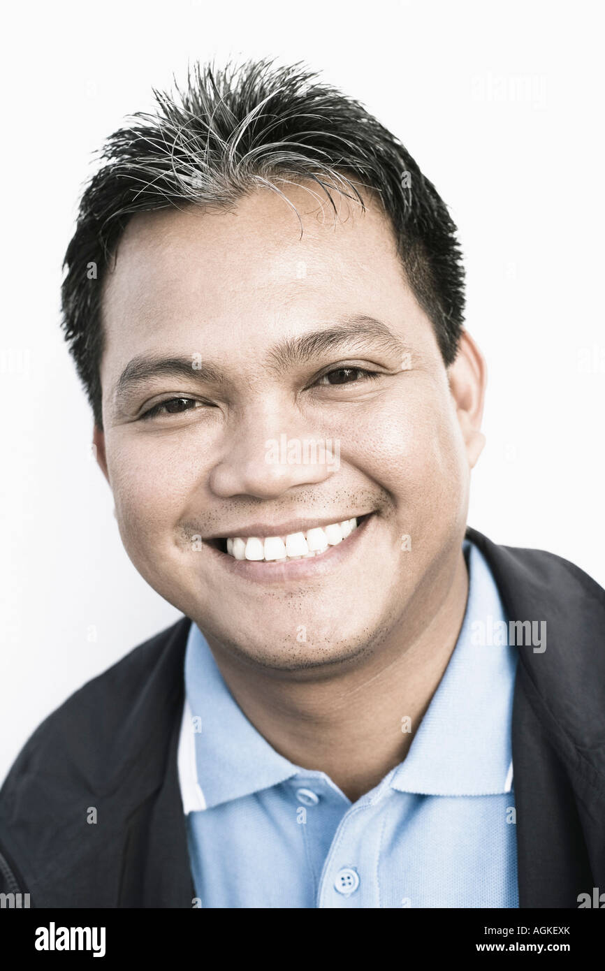 Portrait of a young man smiling Stock Photo - Alamy
