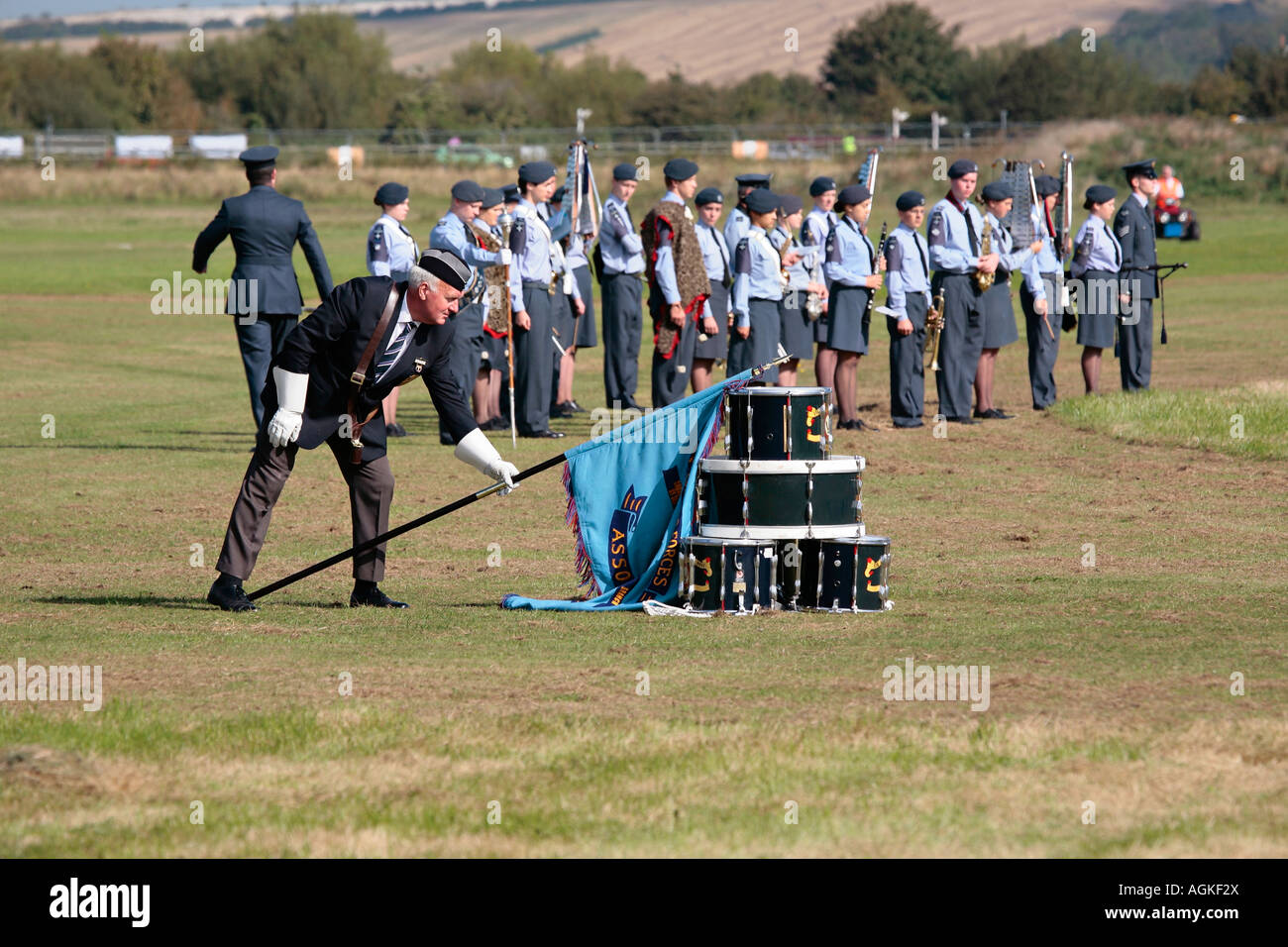 Ex serviceman laying flag against drums at RAFA Remembrance service ...