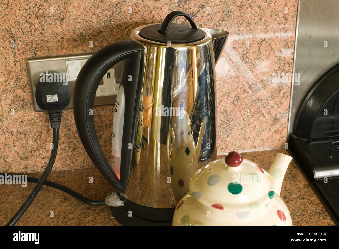 https://c8.alamy.com/comp/AGKF3J/an-electric-kettle-and-teapot-AGKF3J.jpg