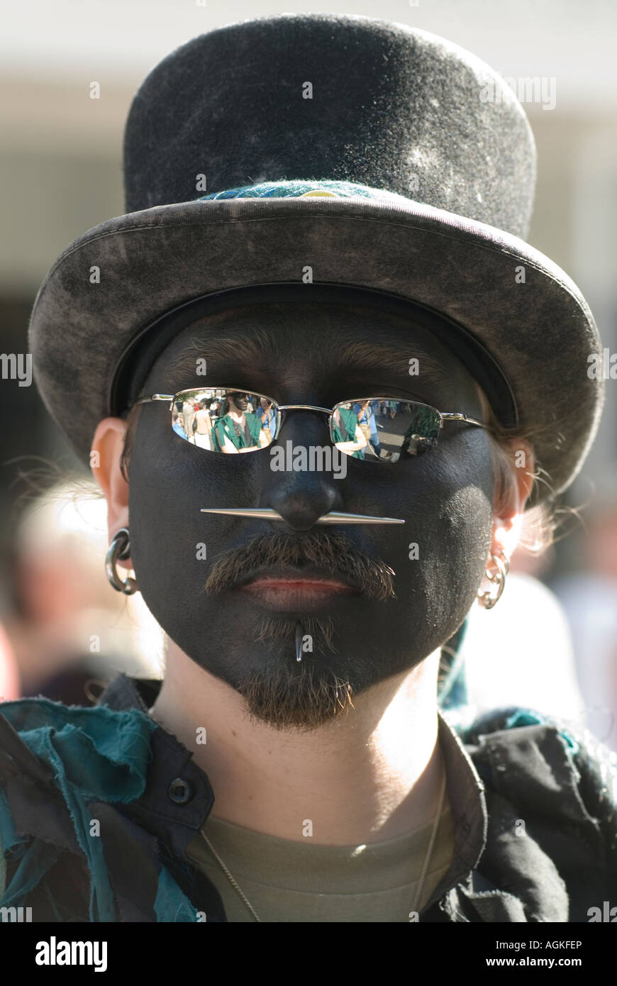 Blacked Up Morris dancers UK. Black face modern Morris dancer with nose and chin piercing Deal Kent England 2007 2000s HOMER SYKES Stock Photo