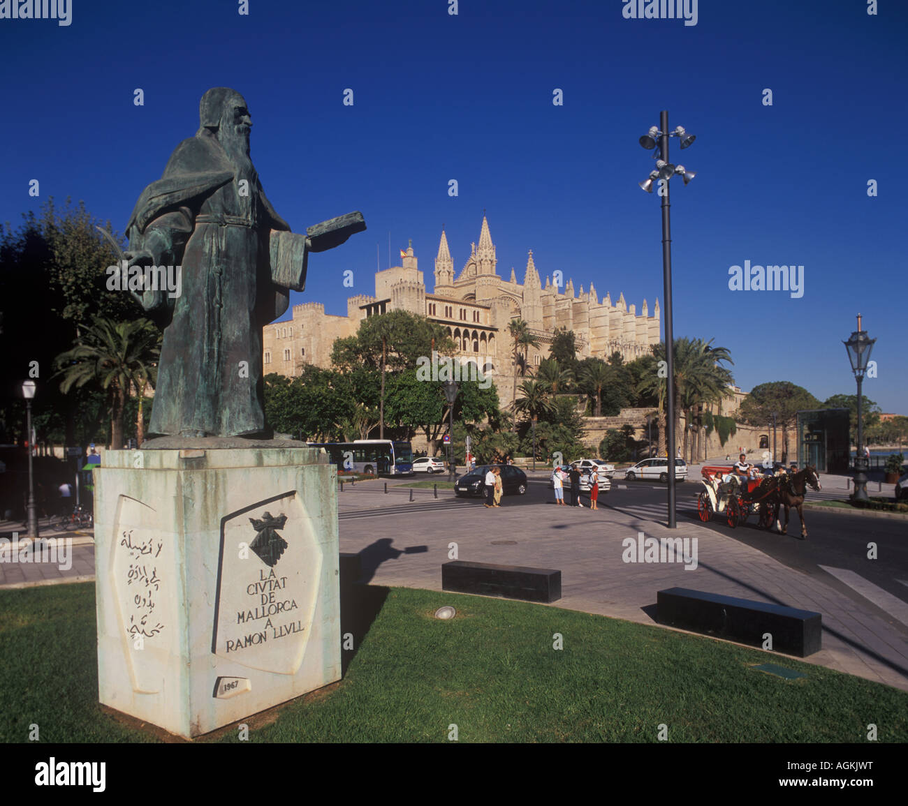 Monument to Ramon Llull scholar + Almudaina Palace, Palma de Mallorca Stock Photo