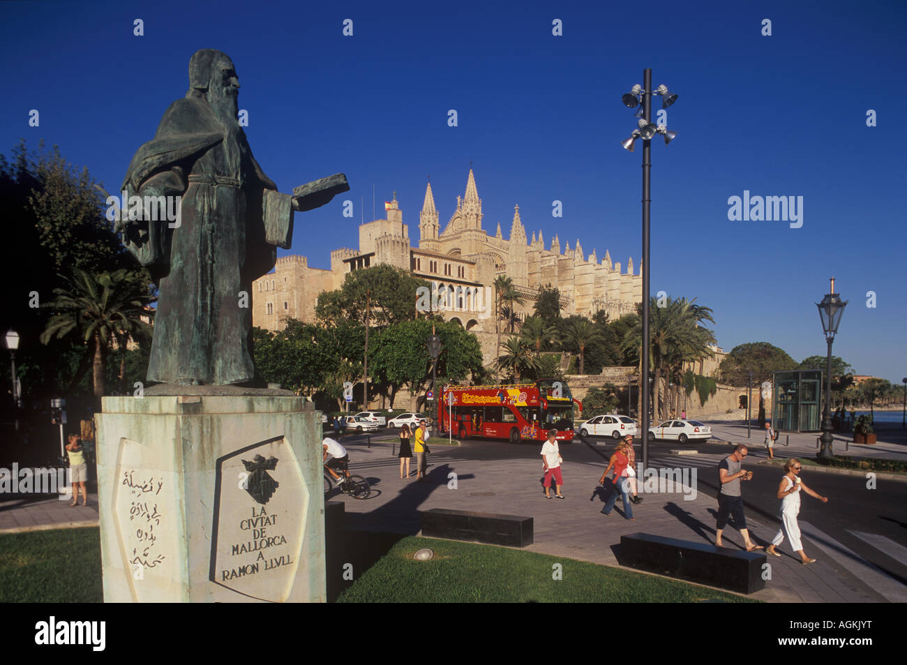 Monument to Ramon Llull, Scholar + Almudaina Palace and Gothic Cathedral, Palma de Mallorca, Spain. Stock Photo