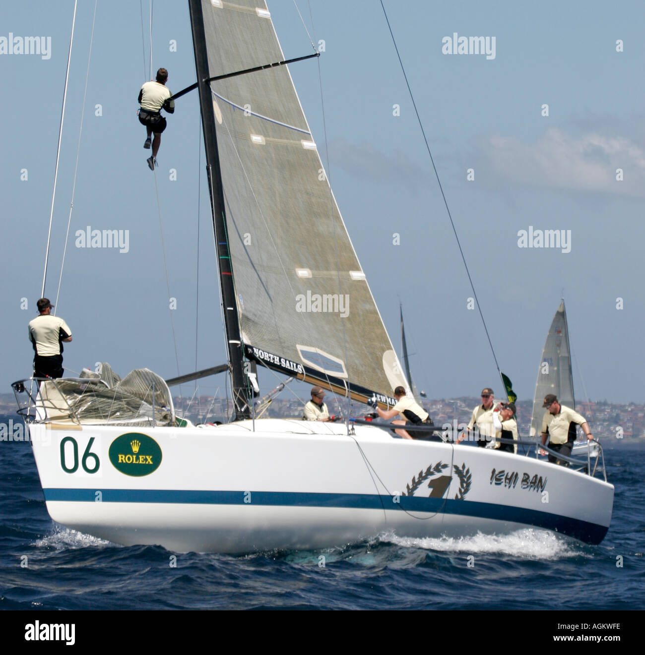 Yacht race off Sydney Australia man in the rigging Stock Photo Alamy