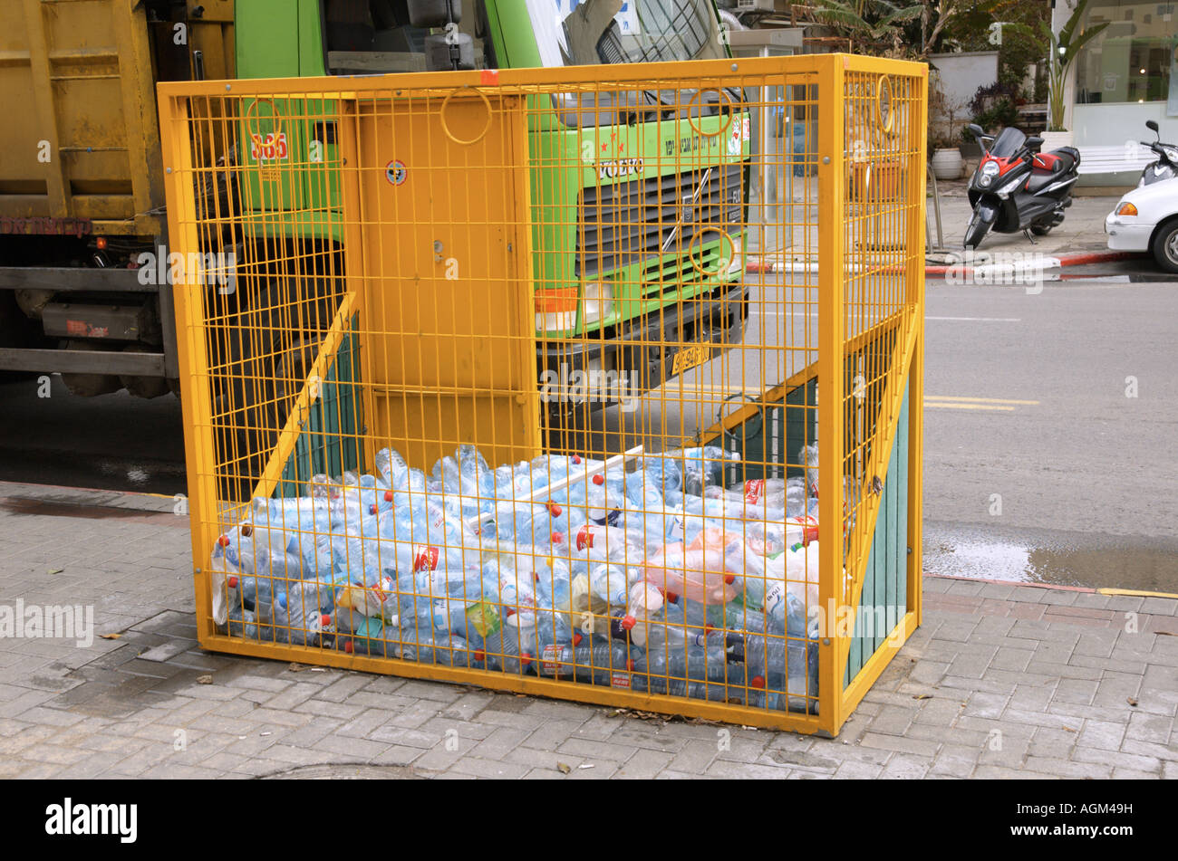 Israel Tel Aviv Plastic bottle recycling bin and a garbage collection
