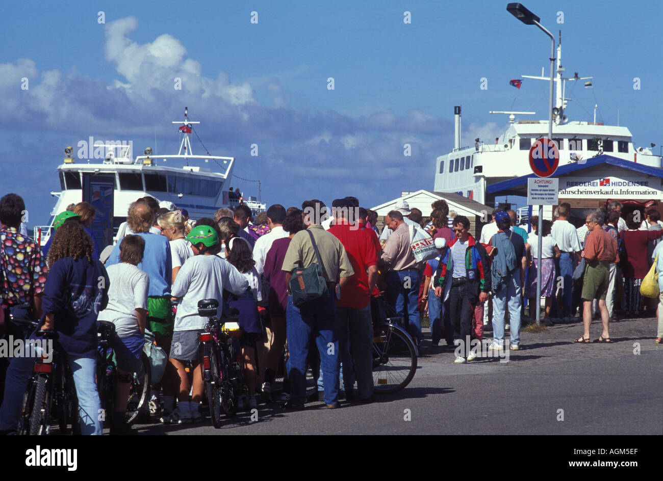 Passengers waiting for a ferry to Hiddensee Island at Schaprode Ruegen Island Mecklenburg West Pomerania Stock Photo
