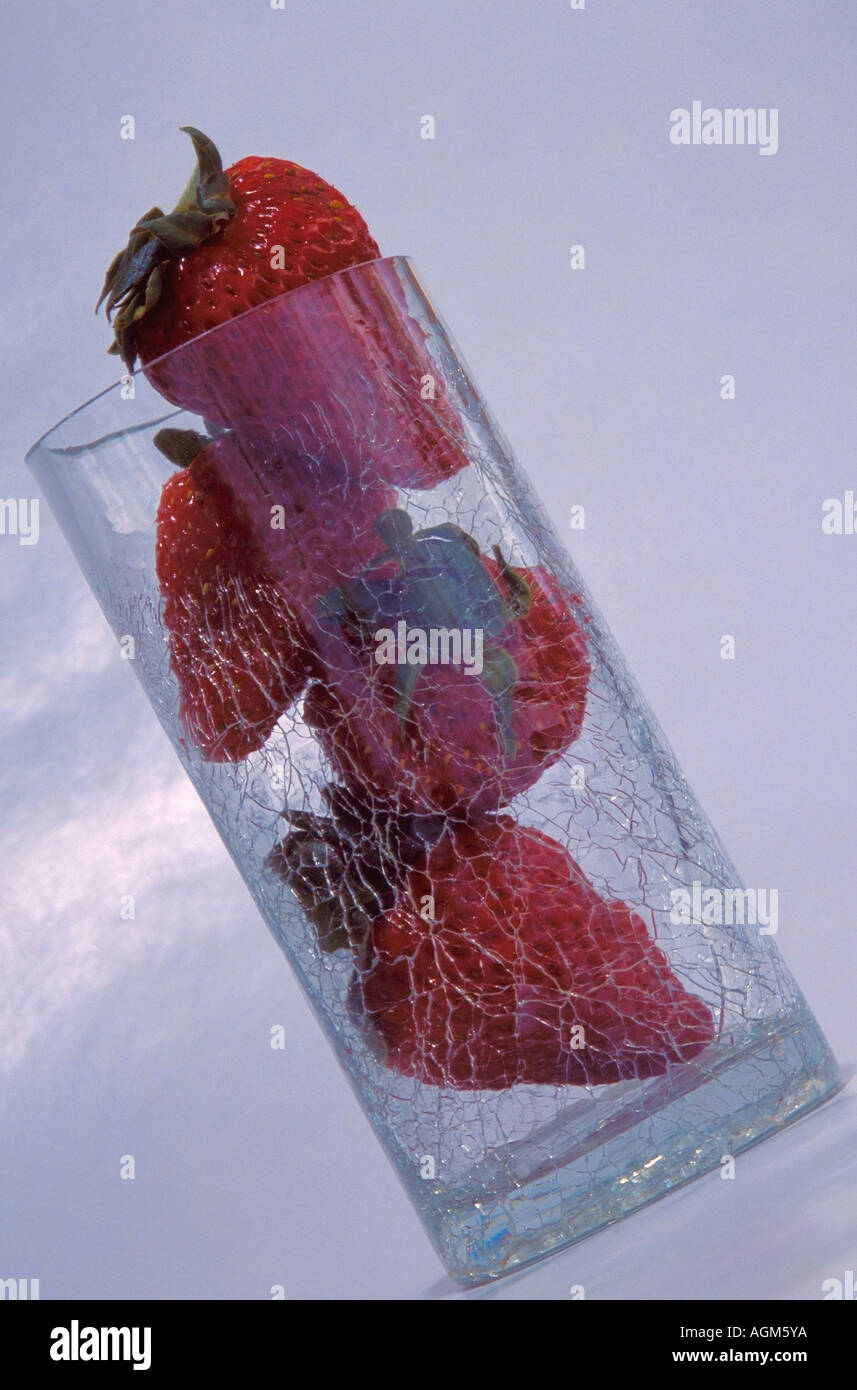 Strawberries in a Cracked Glass Stock Photo - Alamy