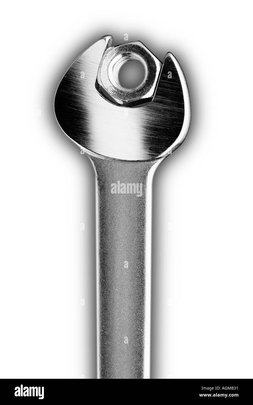 Spanner with a nut. Mechanic, manufacturing, engineering. White background Stock Photo