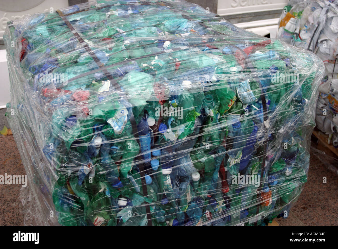 Bundles of plastic bottles and others at recycling plant  Stock Photo