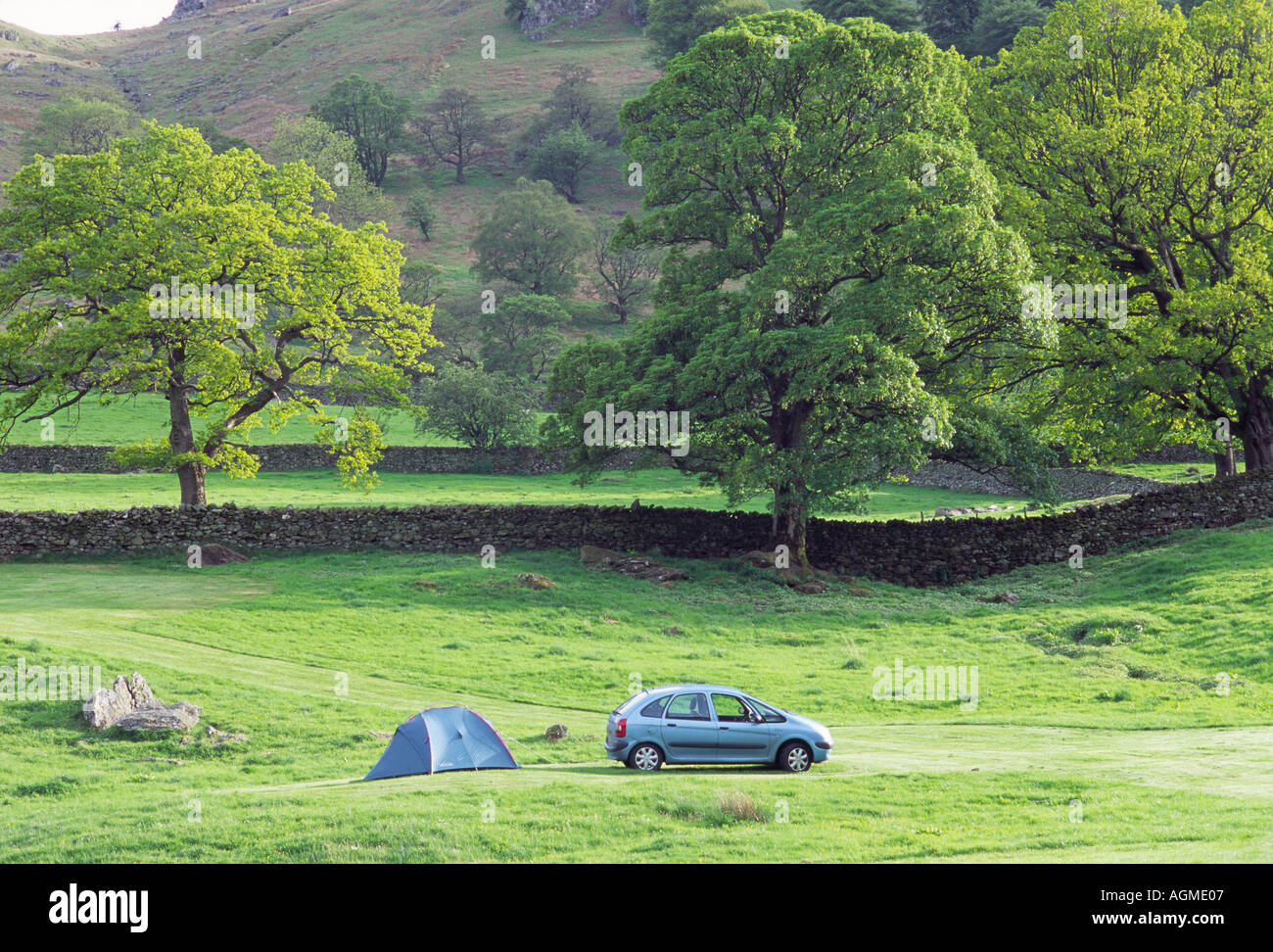 Camping Scene in The Lake District with Small Tent and Citroen Xsara Picasso Stock Photo