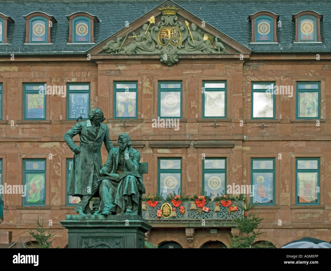 statue of the brothers Grimm market place town hall Hanau Hesse Germany
