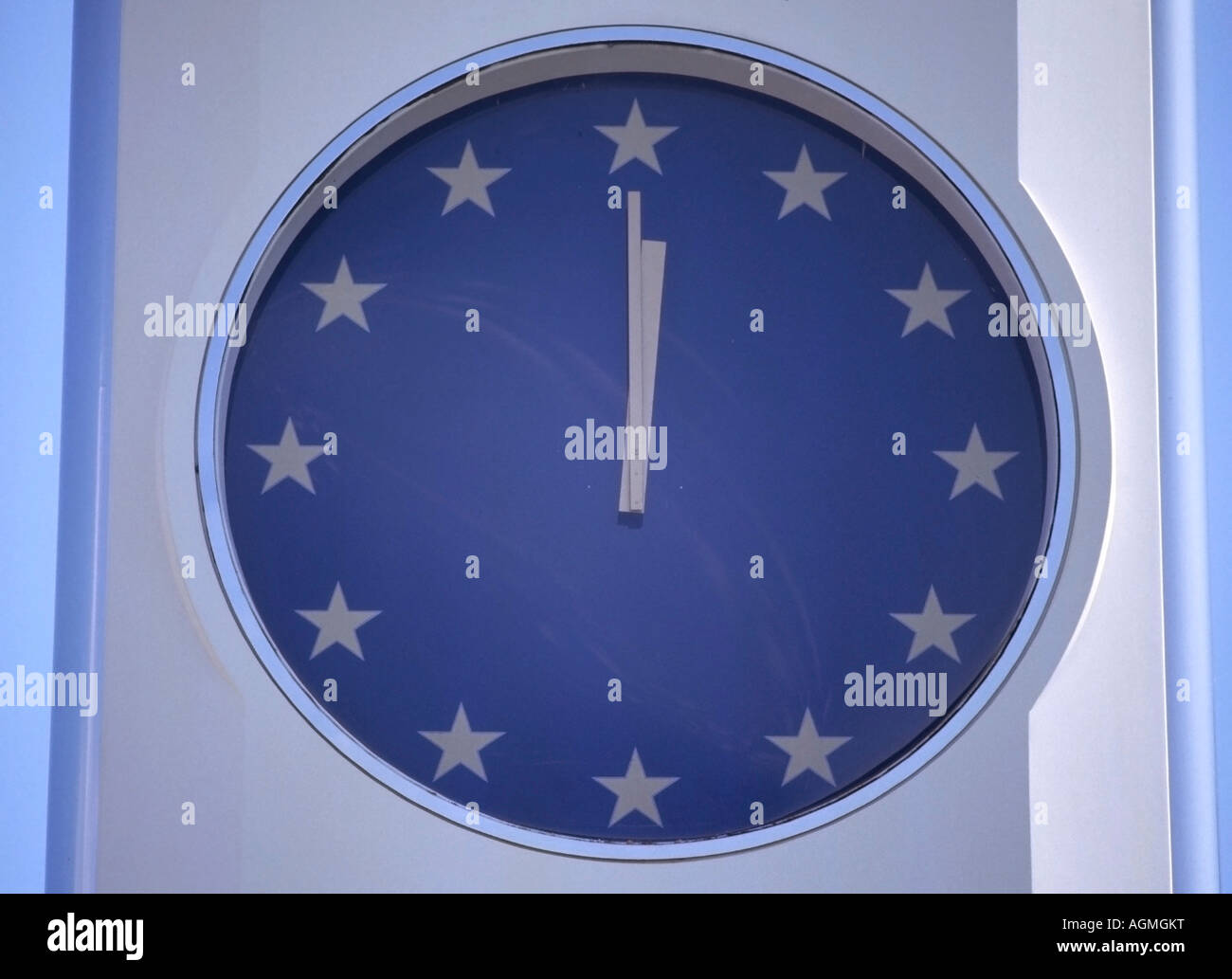 clock with european star symbols showing time 12 o'clock Stock Photo